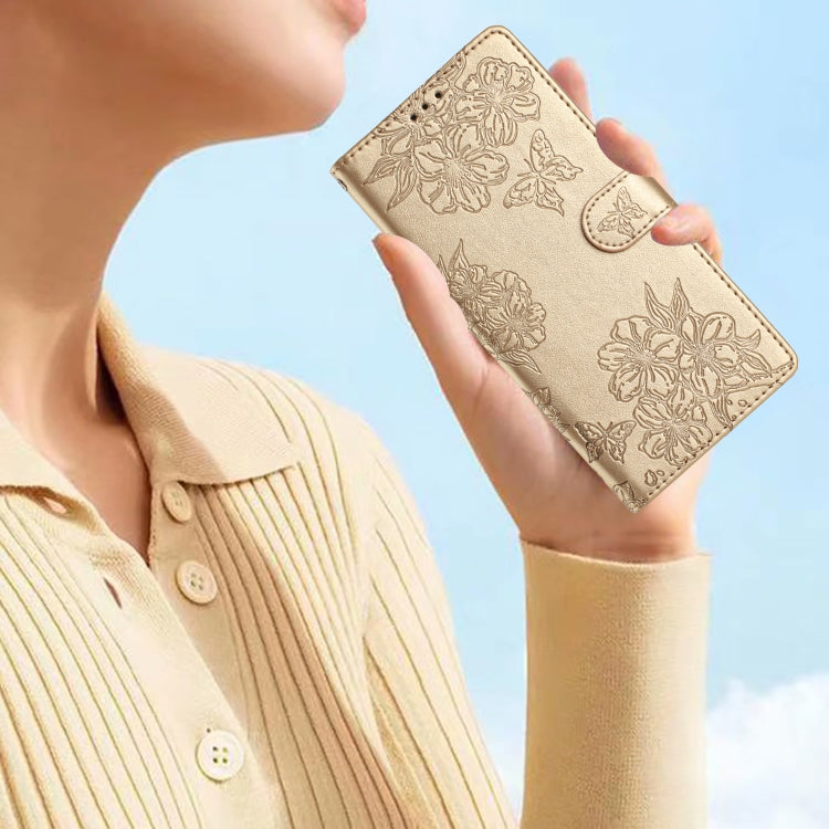 For Samsung Galaxy S25 5G Cherry Blossom Butterfly Skin Feel Embossed PU Phone Case(Gold) - Galaxy S25 5G Cases by PMC Jewellery | Online Shopping South Africa | PMC Jewellery | Buy Now Pay Later Mobicred