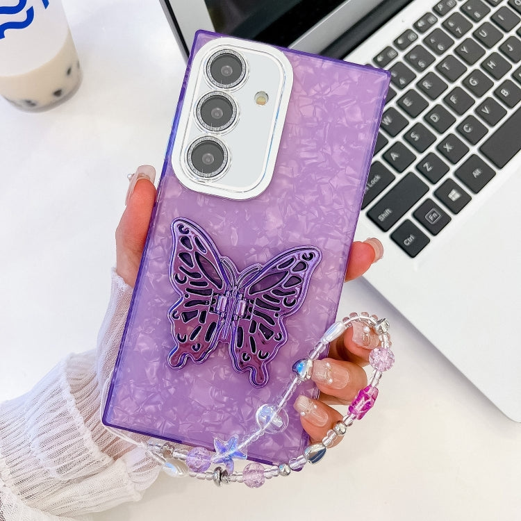 For Samsung Galaxy S25 5G Plating Glitter Lens Film Texture Butterfly Holder Wristband Phone Case(Purple Shell Pattern) - Galaxy S25 5G Cases by PMC Jewellery | Online Shopping South Africa | PMC Jewellery | Buy Now Pay Later Mobicred