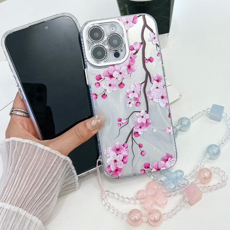 For iPhone 16e Electroplating Flowers Plants Texture Wristband TPU Phone Case(Sakura FL12) - iPhone 16e Cases by PMC TechLife | Online Shopping South Africa | PMC TechLife | Buy Now Pay Later Mobicred