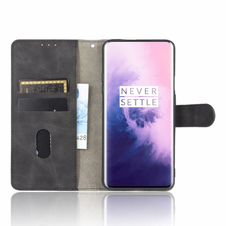 For OnePlus 7 Pro Solid Color Skin Feel Magnetic Buckle Horizontal Flip Calf Texture PU Leather Case with Holder & Card Slots & Wallet(Black) - OnePlus Cases by PMC TechLife | Online Shopping South Africa | PMC TechLife | Buy Now Pay Later Mobicred